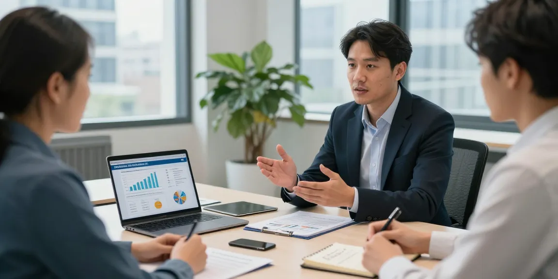 Consultation for merchant cash advance uk with financial advisor and small business owner in a modern office.